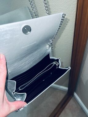 Metallic Silver Chain or clutch chain feature edgy!